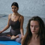 Calm person sitting in meditation pose